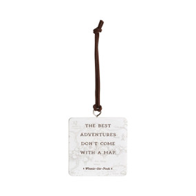 Front facing view of a square white hanging ornament. "The best adventures don't come with a map, Winnie-the-Pooh" is printed over an illustration of the 100 Aker Wood from the classic Winnie-the-Pooh stories.