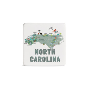 A white square magnet with an illustrated map of North Carolina with landmarks and cities.