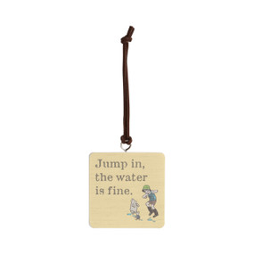 Front facing view of a yellow square hanging ornament with illustrations of classic Winnie-the-Pooh and Christopher Robin in the lower right corner. Pooh and Christopher Robin are jumping in puddles. "Jump in, the water is fine" is printed on the left side.