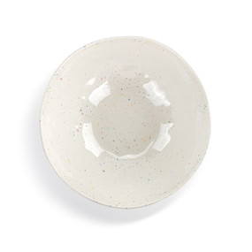 Top down view of a large melamine serving bowl. showing the interior of the bowl. The bowl is white with multicolored dots that resemble confetti.