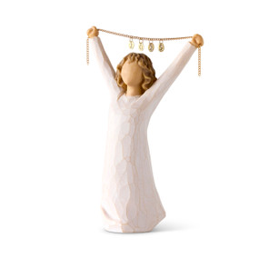 Front view: figure in cream dress holding gold chain above her head with year 2025 on it