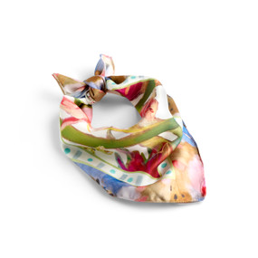 Front angled view of a colorful butterfly print bandana scarf that is folded and tied. The scarf is angled with the knot to the upper left.
