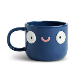 Front facing view of a navy blue character mug. The mug's handle is to the left. The mug is named Charlie Chill Vibe and has a smiling face on his front.
