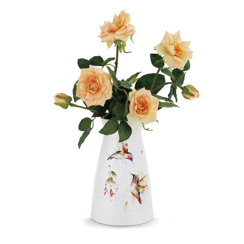 white vase with painted hummingbirds with yellow roses inside