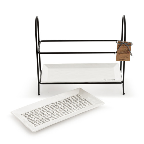 Front view of a black metal wire stand with one white ceramic tray on the bottom rack and the other set in front of the rack.