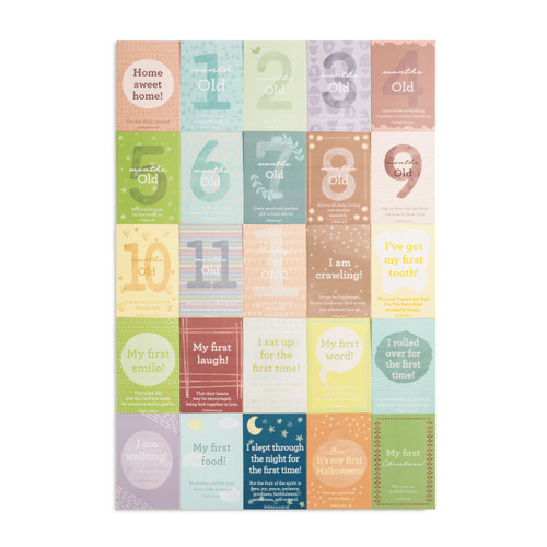 A set of 25 baby milestone cards laid out next to each other on a white background.