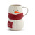 White stoneware stacked set of a bowl and mug on top shaped like a snowman wrapped in a red scarf. There is a red patch on the bowl that says "Stay Cozy".