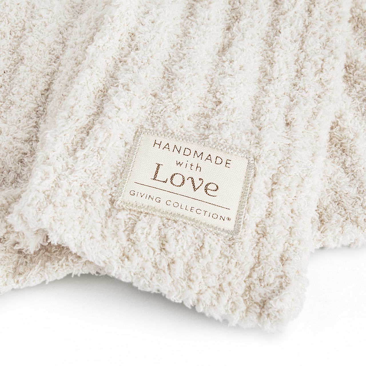 Giving Collection Cream Ribbed Throw Blanket 52" x 62" thumbnail