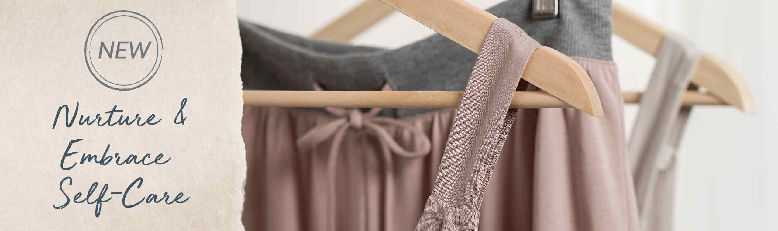 New. Nurture and Embrace Self Care. Soft clothes hanging on hangers.