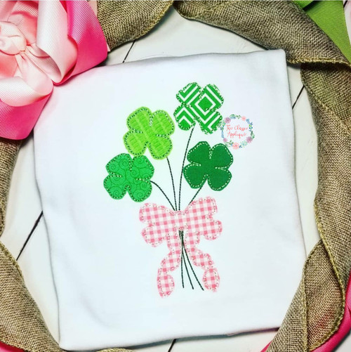 Four leaf clovers with bow