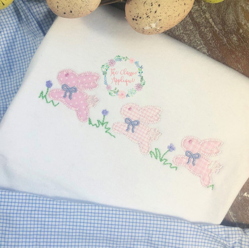 Hopping bunnies with bows zig zag applique Hopping bunnies with bows zig zag applique