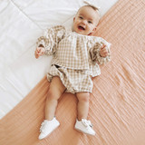 Baby girls wearing Aria First Kicks White, laying down Baby girls wearing Aria First Kicks White, laying down