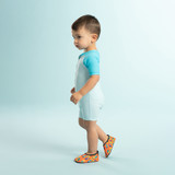 baby boy wearing Cool Pineapple Aqua Shoes Orange