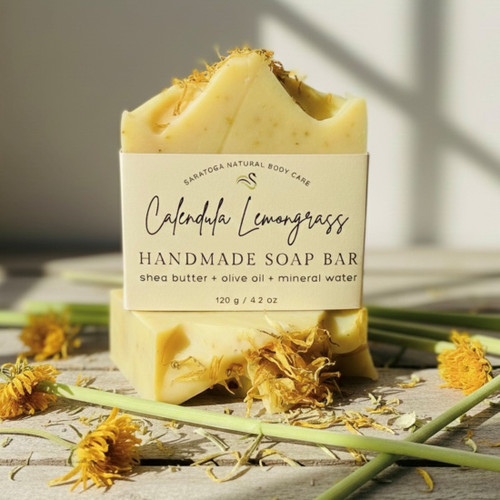 Calendula Lemongrass handmade soap bar by Saratoga Natural Body Care, yellow artisan soap with dried calendula petals, refreshing lemongrass soap made with shea butter and olive oil