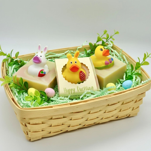 Children’s novelty duck and bunny soap bars in wooden basket with shredded paper, handmade olive oil shea butter kids soap gift