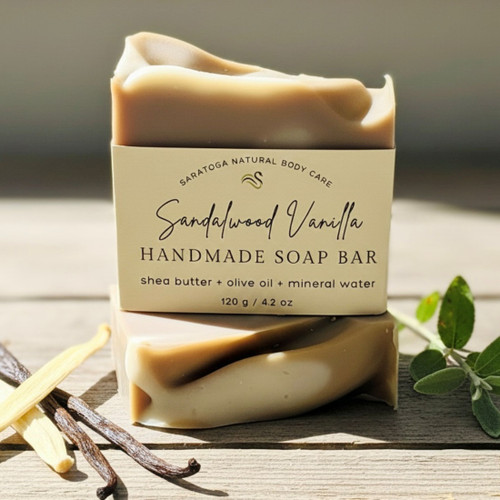 Sandalwood Vanilla handmade soap bar by Saratoga Natural Body Care, creamy beige artisan soap with warm wood and vanilla scent, vegan skincare