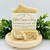 Oatmeal turmeric and honey handmade soap bar with shea butter and olive oil, wrapped in minimalist label and styled with greenery.