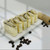 Packaged handmade coffee soap bars in minimal label wrap, creamy mocha artisan soap, natural exfoliating soap with coffee grounds, gift-ready