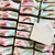 Fresh Lilies soap loaf cut into bars with delicate pink and green swirls, handcrafted vegan soap, floral cold process soap batch