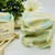 Handcrafted Island Escape soap bars made with shea butter, olive oil, and mineral water, creamy vegan cold-process soapHandcrafted soap featuring a deliciously sweet and tropical aroma of juicy mandarin, creamy coconut, and bright red currant. This uplifting scent brings a fresh, island-inspired feel to your daily routine.

• High in plant-based oils and butters that gently cleanse while helping to maintain skin’s natural moisture
• Handmade with the highest quality oils and our locally sourced iconic mineral water
• The combination of premium oils and mineral water ensures gentleness and excellent skin tolerance, creating a truly unique experience
• Crafted one batch at a time using the traditional cold-process method for a rich, creamy, and luxurious lather

To extend the life of your soap and avoid messy residue, we recommend using a soap saver.

Our Skin-Loving Ingredients:
Olive Oil, Coconut Oil, Spring Water, Sodium Hydroxide, Shea Butter, Castor Oil, Fragrance Oil,