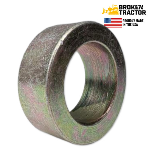 Spacer bushing for Case backhoe boom to swing tower pin