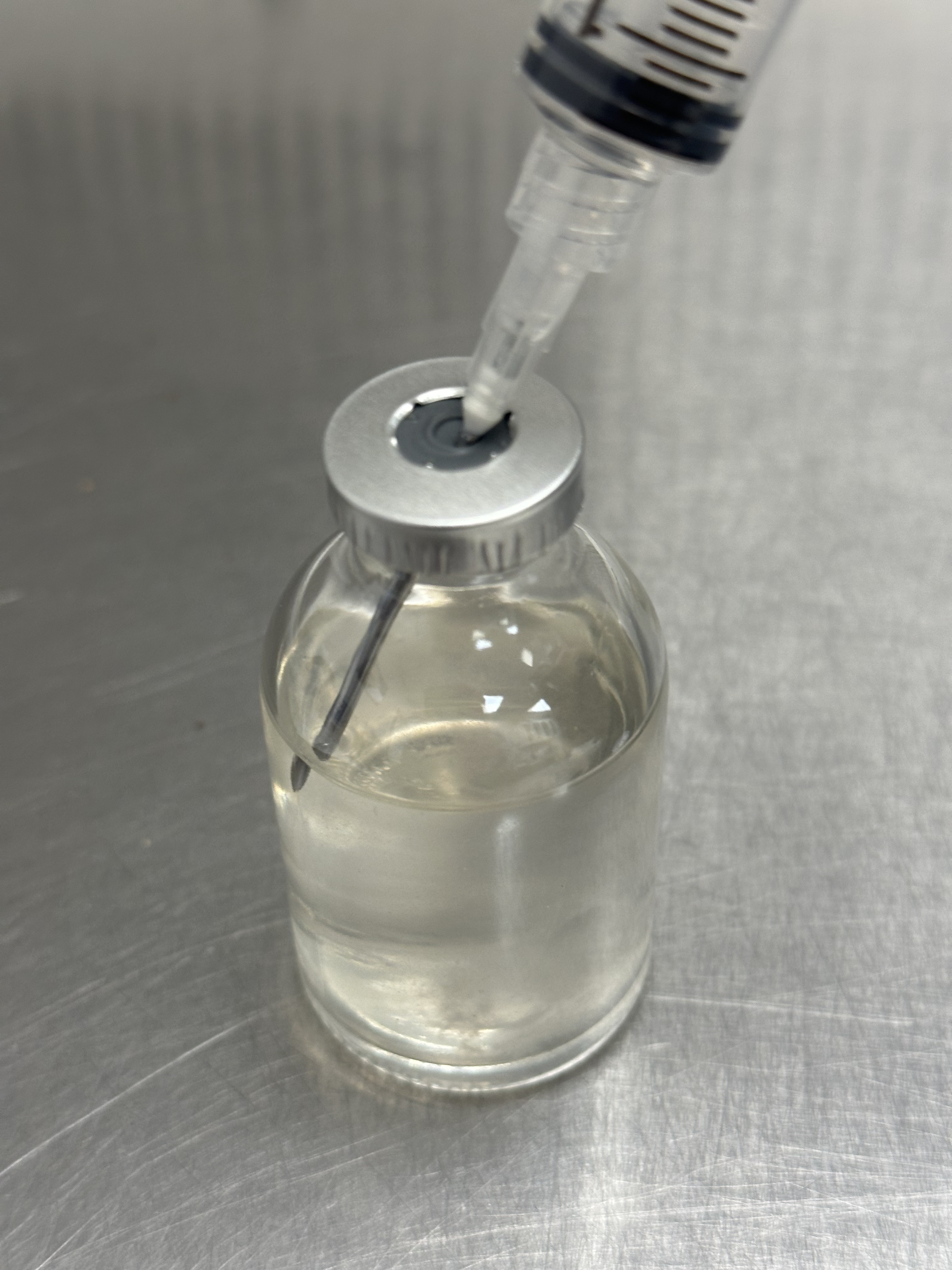 Withdrawing solution from the 30ML Master Isolate Vial