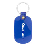 A blue oval keychain with a silver keyring and a small decorative element at the top. It features branding on the front.