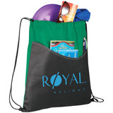 A green and black drawstring sportspack, filled with a frisbee, sunglasses, and various items, featuring a logo.
