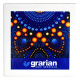 A square ceramic coaster featuring a vibrant blue design with orange and yellow dots, alongside branding.