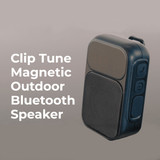 A black and grey Bluetooth speaker with a magnetic back and control buttons, featuring a mesh speaker grille.