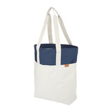 A tote bag featuring a navy blue top section and a cream-coloured lower section, with long handles and a logo.