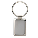 A rectangular silver keyring with a smooth, brushed metal surface and a circular ring for attaching keys.