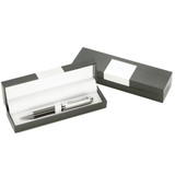 A stylish silver pen in a sleek grey box, featuring a simple white insert and branding.