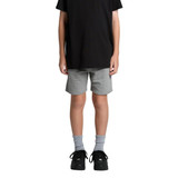 Youth stadium shorts in grey, paired with a black t-shirt and black shoes, worn by a child. Features a logo.