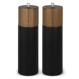 A pair of salt and pepper grinders with wooden tops and ribbed black bases. Each grinder has a silver knob on top.
