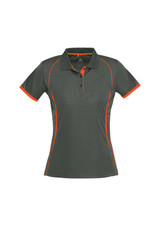 A women's polo shirt in dark grey with orange accents and a logo. Features short sleeves and a classic collar design.