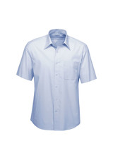 A light blue short sleeve button-up shirt featuring a single chest pocket and a logo.