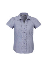 A short sleeve button-up shirt in blue and white stripes, featuring a ruffled front and a logo.