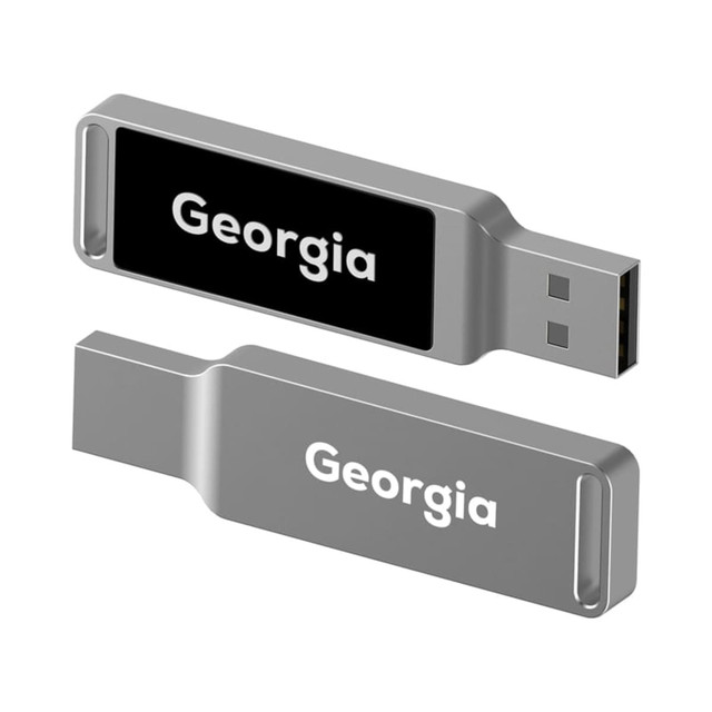 A silver LED flash drive with a black and white branded section, featuring a USB connector.