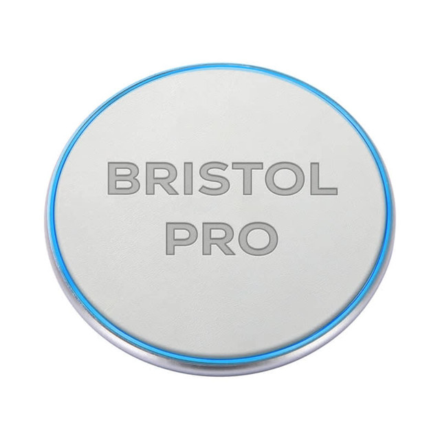 A round, light grey wireless charger with a blue edge and a logo on the surface.