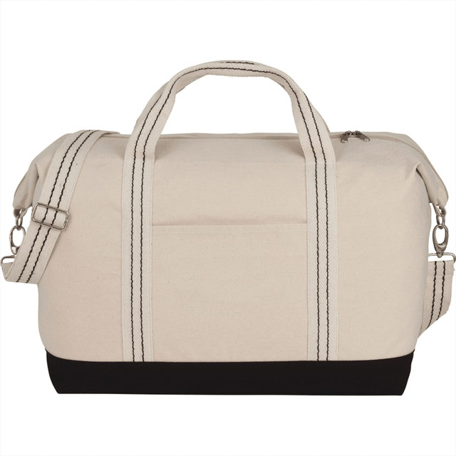 A cotton canvas duffel bag in cream and black, featuring dual handles and a shoulder strap, with a logo.
