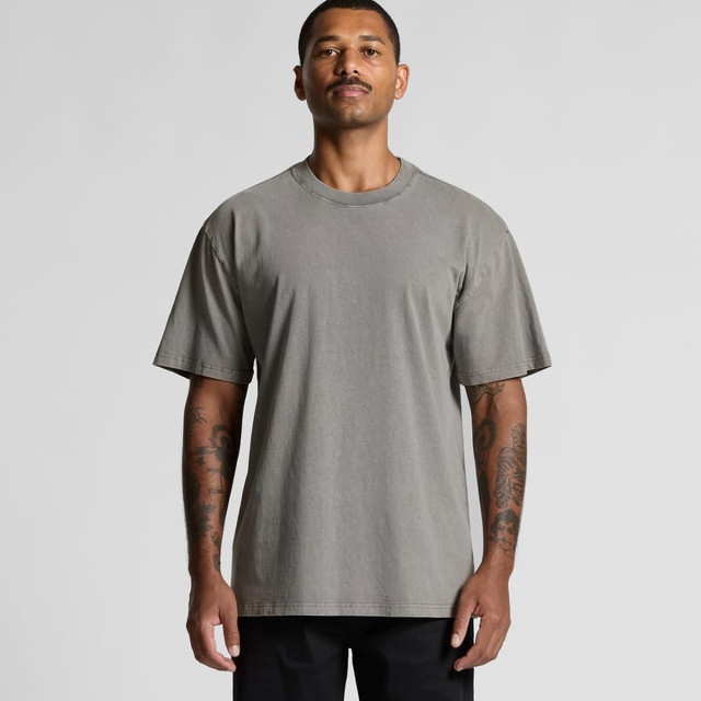 A grey heavy faded t-shirt with a relaxed fit and short sleeves, featuring a logo.