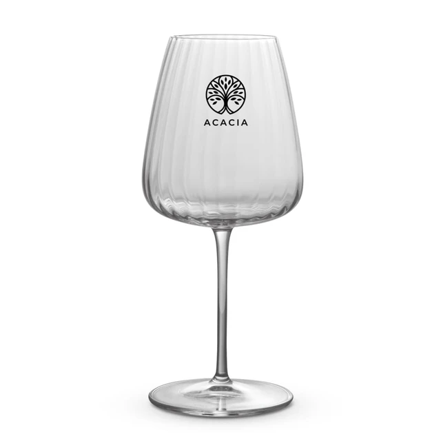 A clear glass wine glass with a ribbed design and a logo on the front, featuring a slender stem.