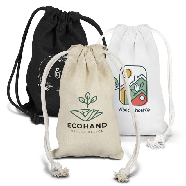 Three small cotton gift bags in black, white, and natural tones, each with a different design and logo.