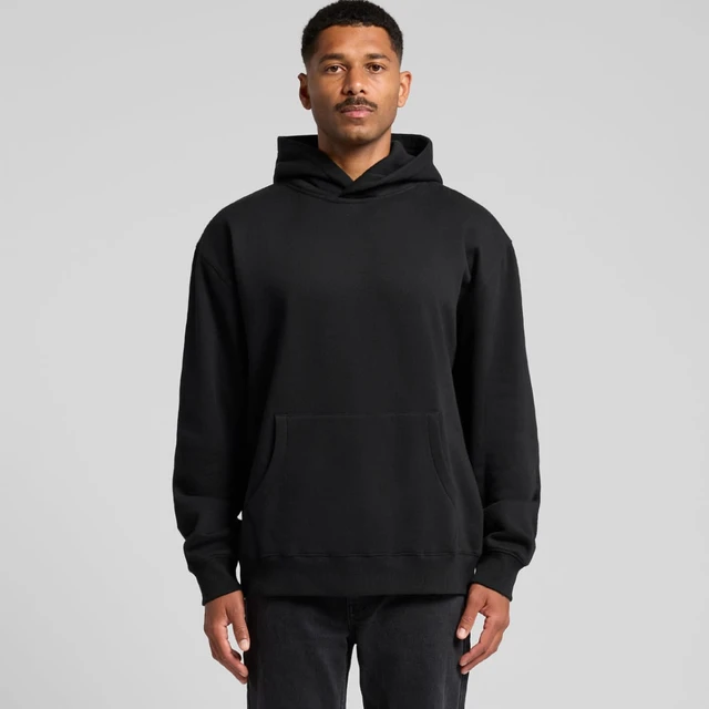 A black hoodie featuring a front pocket and a hood, worn by a standing man. It has a logo on the garment.