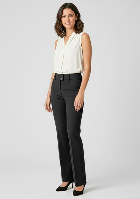 A model in a sleeveless white top and black slacks poses against a plain background. The slacks feature a logo.
