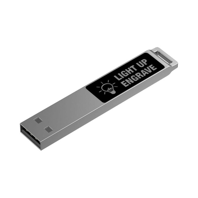 A silver LED flash drive featuring a black surface with an engraved logo.
