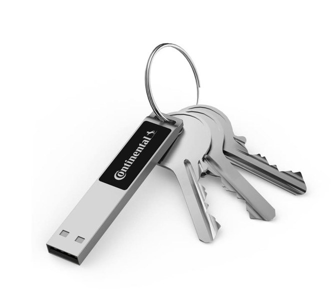 A silver LED flash drive attached to a keyring with several metal keys. The drive has a logo on its side.