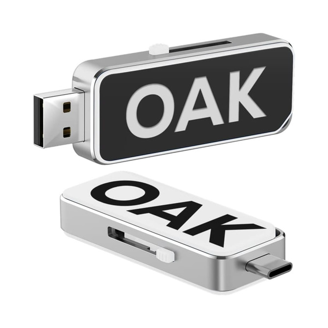 A silver and black USB flash drive with a Type-C connector and a logo.