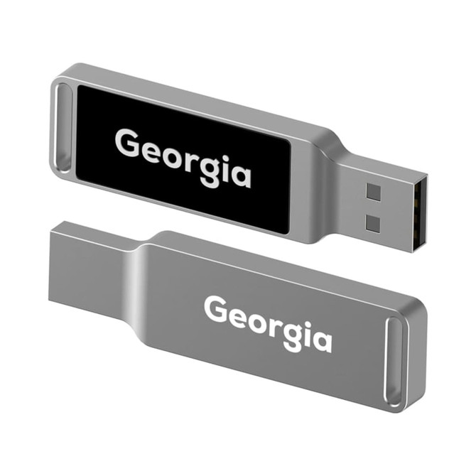 A silver LED flash drive with a black and white branded section, featuring a USB connector.